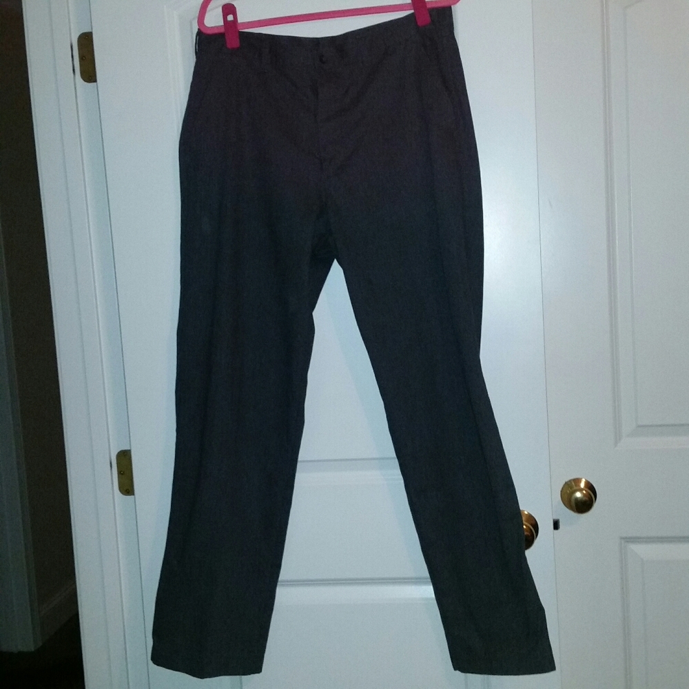 Mens dark grey flannel trousers.